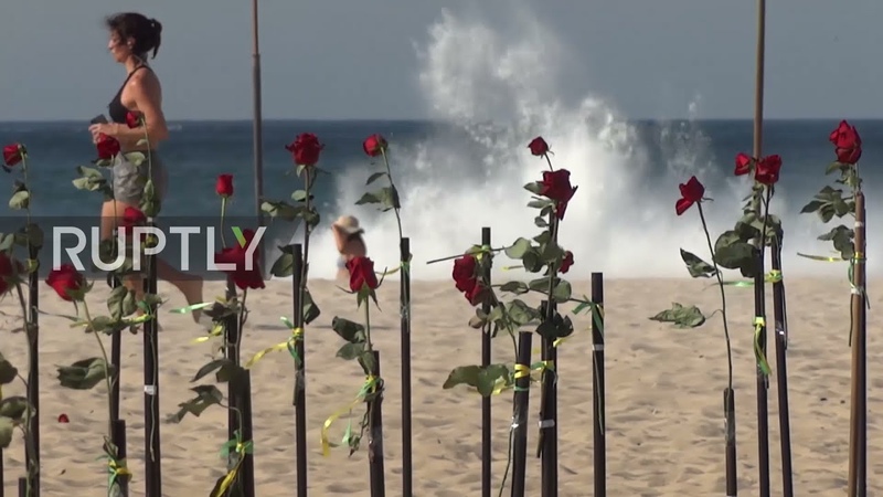 Brazil: 500 red roses adorn Copacabana beach to honour countrys 500, 000 COVID