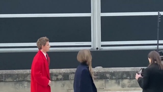 Eddie Redmayne (R) and Hannah Bagshawe ar fashion show Alexander McQueen Womenswear Fall WinteMa#